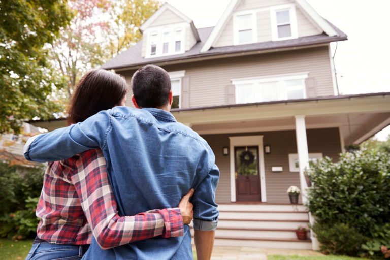 couple looking at their new home