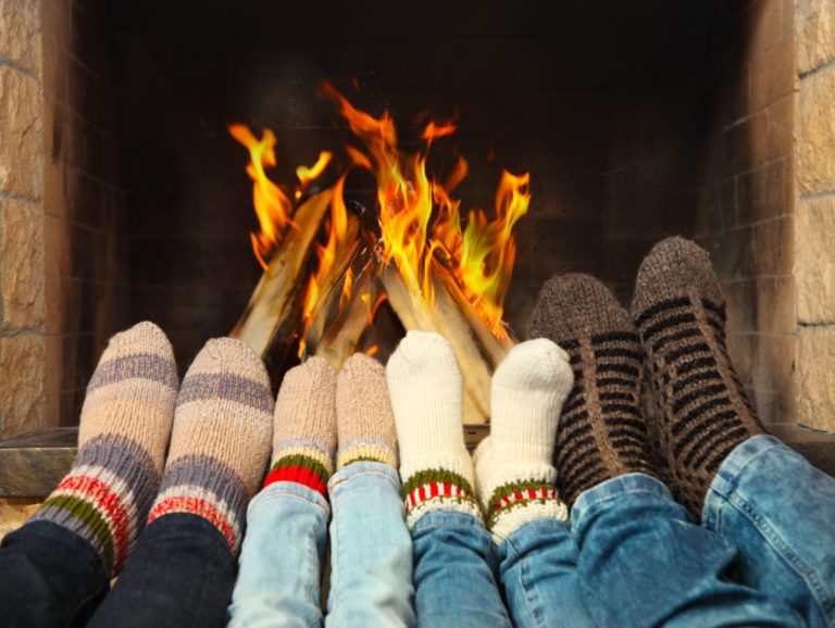 keeping feet warm by the fireplace