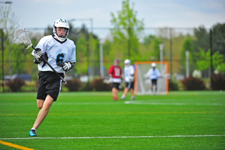 A fit teenager playing team sports