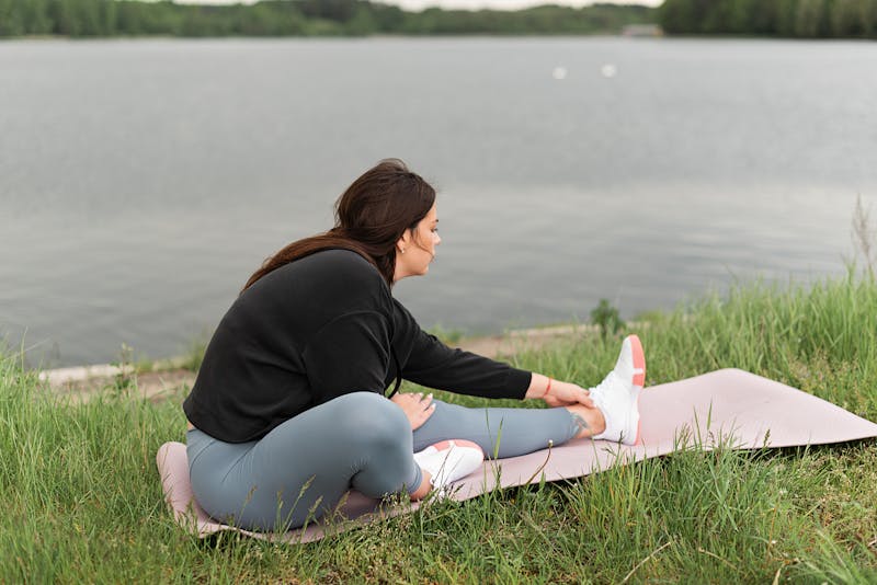 a woman doing some stretching