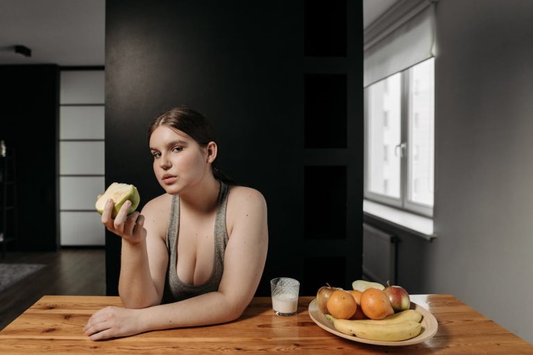 a woman eating fruits